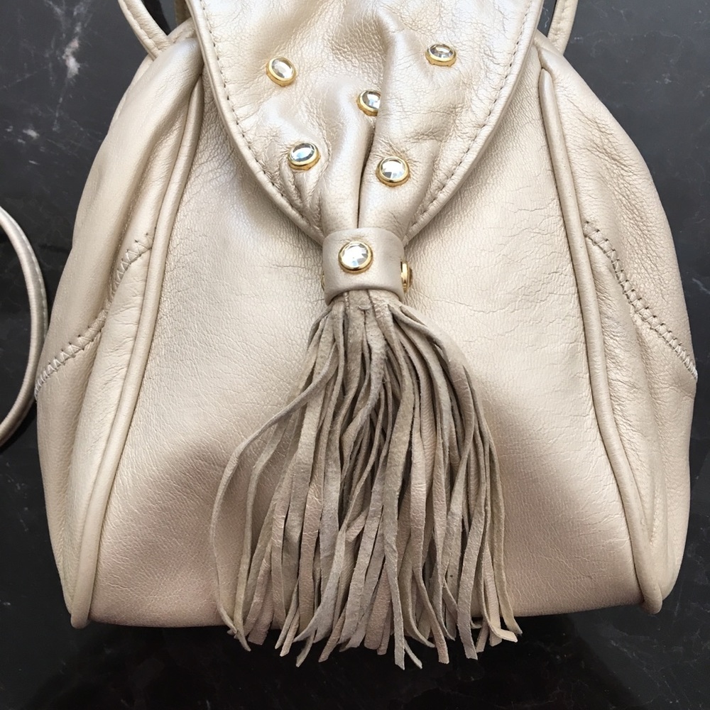 Vintage leather crossbody bag w/ stones and fringe